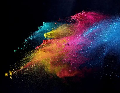 A colorful explosion powder on black background.. Multicolored powder explosion, AI generated