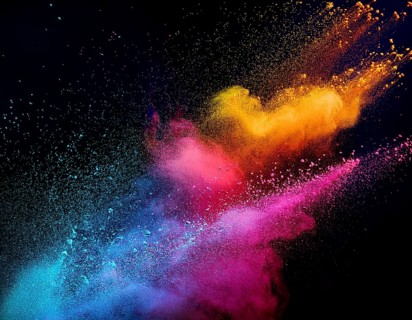 A colorful explosion powder on black background.. Multicolored powder explosion, AI generated