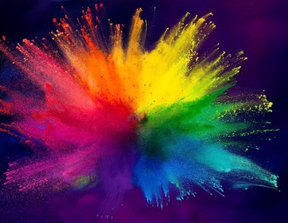 Colorful abstract art depicting a vibrant explosion of rainbow hues on a dark background, evoking
