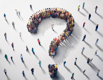 Large group of people arranged in the shape of a question mark, symbolizing inquiry or uncertainty,