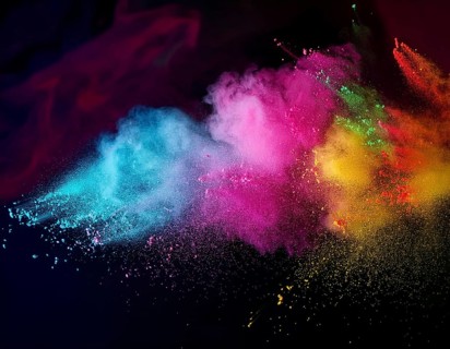 A colorful explosion powder on black background.. Multicolored powder explosion, AI generated