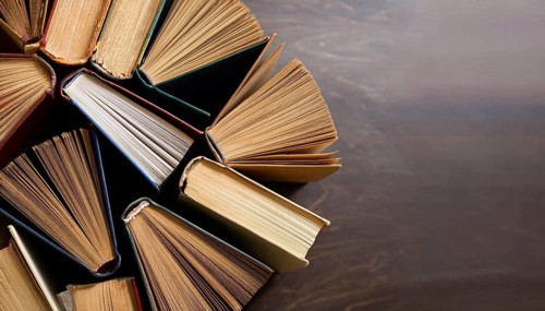 Old books arranged highlighting their historical significance. Neatly arranged representing a