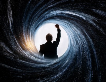 A silhouette of a person appears to fall into a brightly lit vortex amidst cosmic spirals, AI