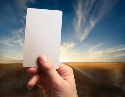 Hand holding a sheet of paper in hand.. AI generated image, ai