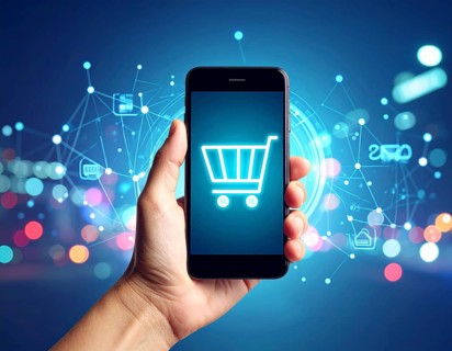 Hand holding smartphone glowing shopping cart icon poster symbolizing online shopping, e-commerce,