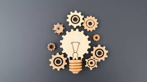Light bulb with gears concept poster symbolizing creativity, invention, innovation, mechanical