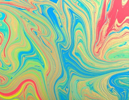 Colorfully painted background with vivid brush strokes and abstract design, symbolizing creativity,