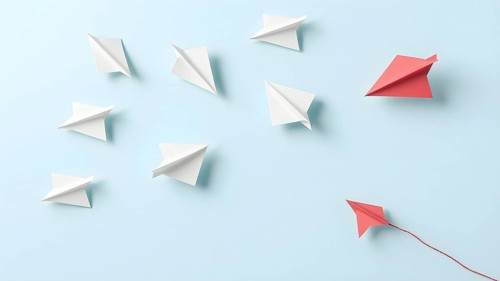Colorful paper planes arranged in organized pattern, symbolizing creativity, playfulness,