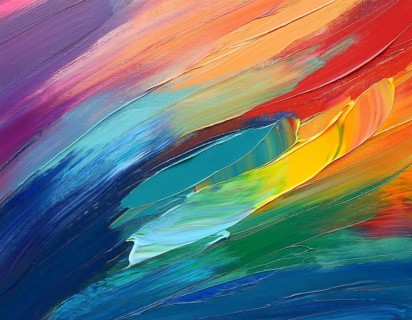 Vibrant rainbow brush strokes create abstract artistic background, blending vivid hues into modern