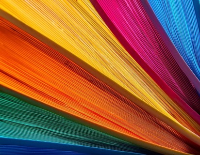 Multi color background bursting with vivid tones, artistic expression, and modern abstract design