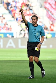 Referee Referee Robert Hartmann shows yellow card yellow caution Football Bundesliga, PreZero