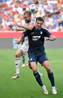 Header duel duel action Fisnik Asllani TSG 1899 Hoffenheim (11) against Konrad Laimer FC Bayern
