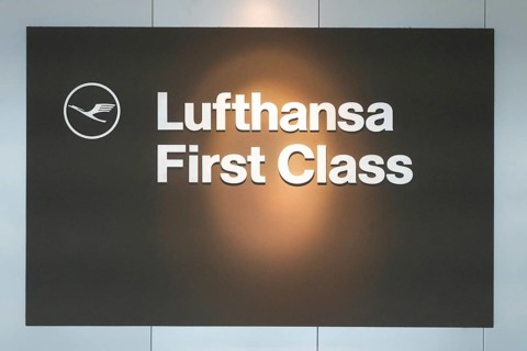 Illuminated sign in the airport for a lounge with the inscription Lufthansa First Class, Frankfurt,