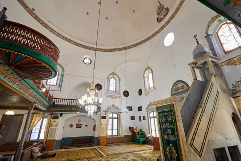 Magnificent mosque interior with chandelier and prayer rugs, Ibrahim Pasha Mosque, Old Town,
