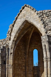 Church of Virgin Mary of the Castle, detailed view of a Gothic ruin with a striking window under a