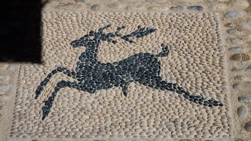 Mosaic artwork of a deer made of pebbles in the street, Turkish Quarter, Rhodes Old Town, Rhodes