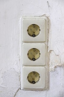 Symbolic image of need for refurbishment, sockets with child protection, Germany