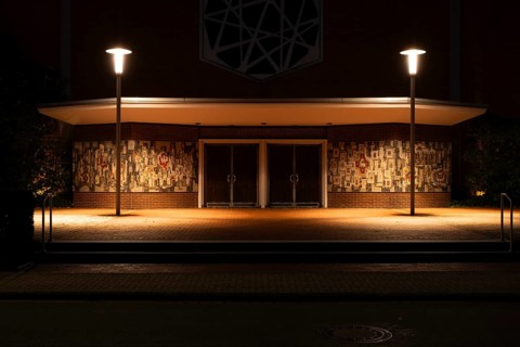 Night shot of the main entrance to the parish church of St Peter and Paul, Neustadt am Rübenberge,