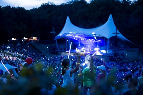 Children with lightsabers at the 25th Berlin Flashlight Concert at the Berlin Waldbühne on