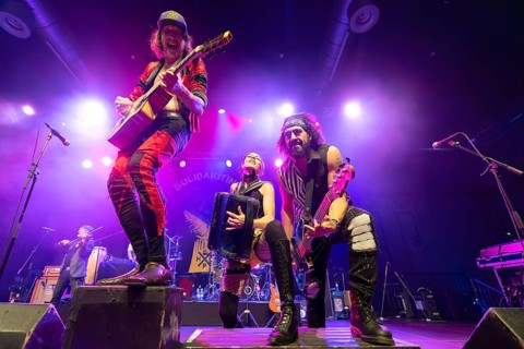 Eugene Hütz, left, singer and guitarist, Gogol Bordello, folk-punk band, USA, live on Fall 2025