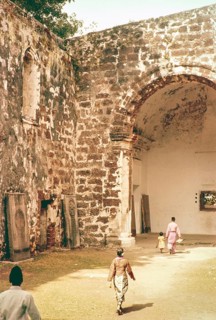 People inside ruined church of Saint Paul Malacca or Melaka, Malaya, Malaysia, south east Asia 1964