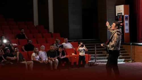 Turkish singer Coskun Sabah performs on stage at Gaziantep University as part of the Türkiye Kültür