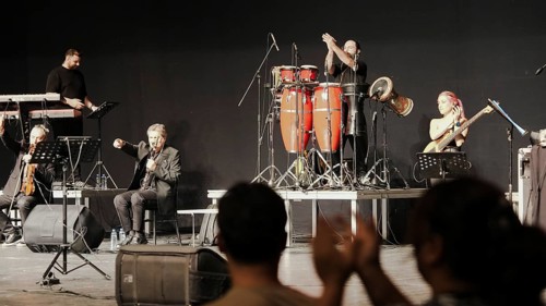 Musicians play on stage alongside Turkish singer Coskun Sabah during the Türkiye Kültür Yolu