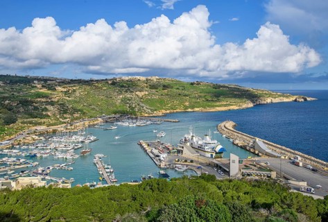 View of Gozo Mgarr Harbour harbour basin with small boats yachts yachts on the left, in the centre