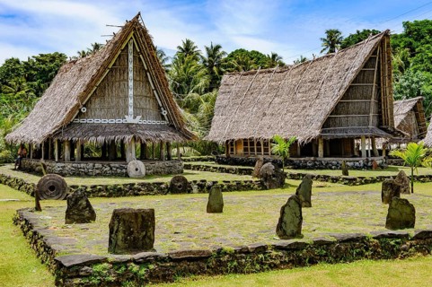Left traditional community house right Faluw men's house Men's House meeting houses in museum