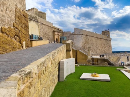 Left staircase to Tor tor of Cittadella Citadel of Gozo, bottom right monument to Ottoman invasion,
