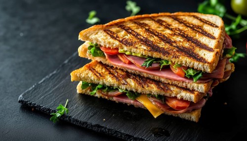 Delicious Grilled Ham And Vegetables Double Sandwich On Dark Background With Cheese. Fast Food