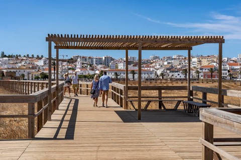 The skyline of the historic centre of Lagos, on the river Bensafrim, view from the boardwalk on the