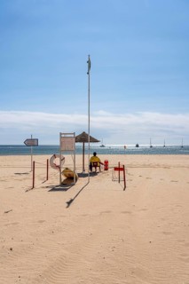 The Praia de São Roque beach, east of Lagos town centre, quite empty, lifeguards on duty,