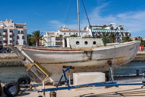 Old wooden boat in the Marina de Lagos, marina, Lagos, in the west of the Algarve, Portugal