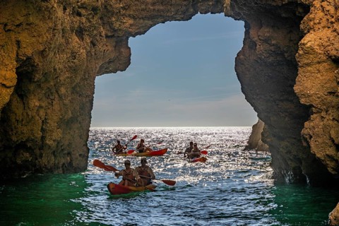 Tour with sea kayaks to the Ponta da Piedade rocky coast, rugged coastal landscape, right next to