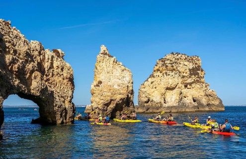 Tour with sea kayaks to the Ponta da Piedade rocky coast, rugged coastal landscape, right next to