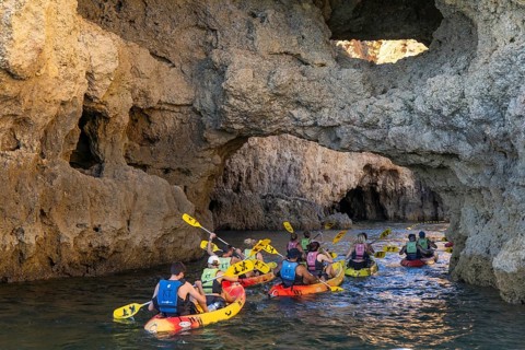 Tour with sea kayaks to the Ponta da Piedade rocky coast, rugged coastal landscape, right next to