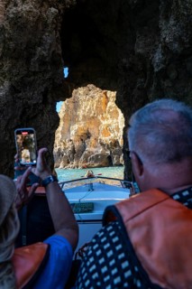 Tour with a small motorboat to the Ponta da Piedade rocky coast, rugged coastal landscape, right