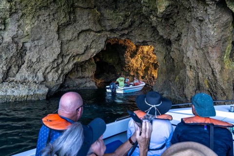 Tour with a small motorboat to the Ponta da Piedade rocky coast, rugged coastal landscape, right