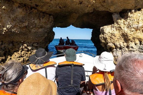 Tour with a small motorboat to the Ponta da Piedade rocky coast, rugged coastal landscape, right