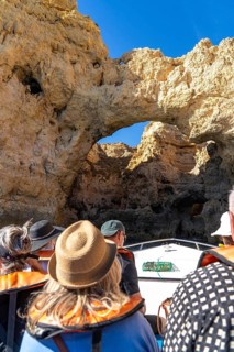 Tour with a small motorboat to the Ponta da Piedade rocky coast, rugged coastal landscape, right