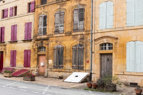 Historic house facade, abandoned building, yellow sandstone, Marville, Renaissance village,