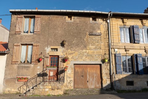 Historic house façade, yellow sandstone, Marville, Renaissance village, Département Meuse, Grand