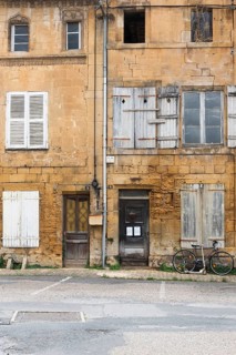 Historic house facade, abandoned building, yellow sandstone, Marville, Renaissance village,