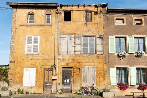 Historic house façade, yellow sandstone, Marville, Renaissance village, Département Meuse, Grand