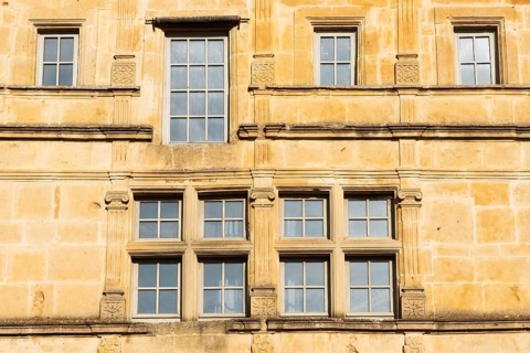 Window, historic house facade, yellow sandstone, Marville, Renaissance village, Département Meuse,