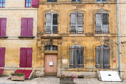 Historic house facade, abandoned building, yellow sandstone, Marville, Renaissance village,