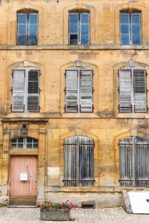 Historic house facade, abandoned building, yellow sandstone, Marville, Renaissance village,