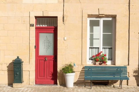 Entrance decorated with flowers, bench, Marville, Renaissance village, Département Meuse, Grand