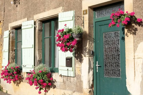 Entrance decorated with flowers, Marville, Renaissance village, Département Meuse, Grand Est,